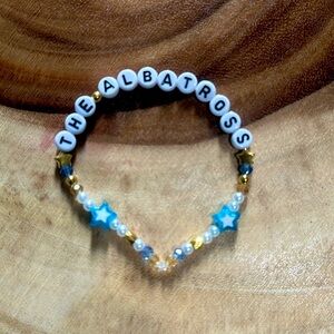 5 for $10 Taylor Swift Handmade Friendship Beaded Bracelet
“The Albatross”